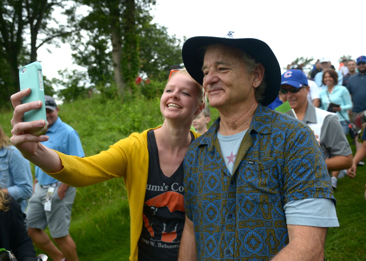 Actor Bill Murray poses for picture with Kelly Segura, of Moline, while he plays in the John Deere Classic Pro-Am on Wednesday, July 8, 2015, in Silvis. (Photo by Todd Mizener - Dispatch/Argus)