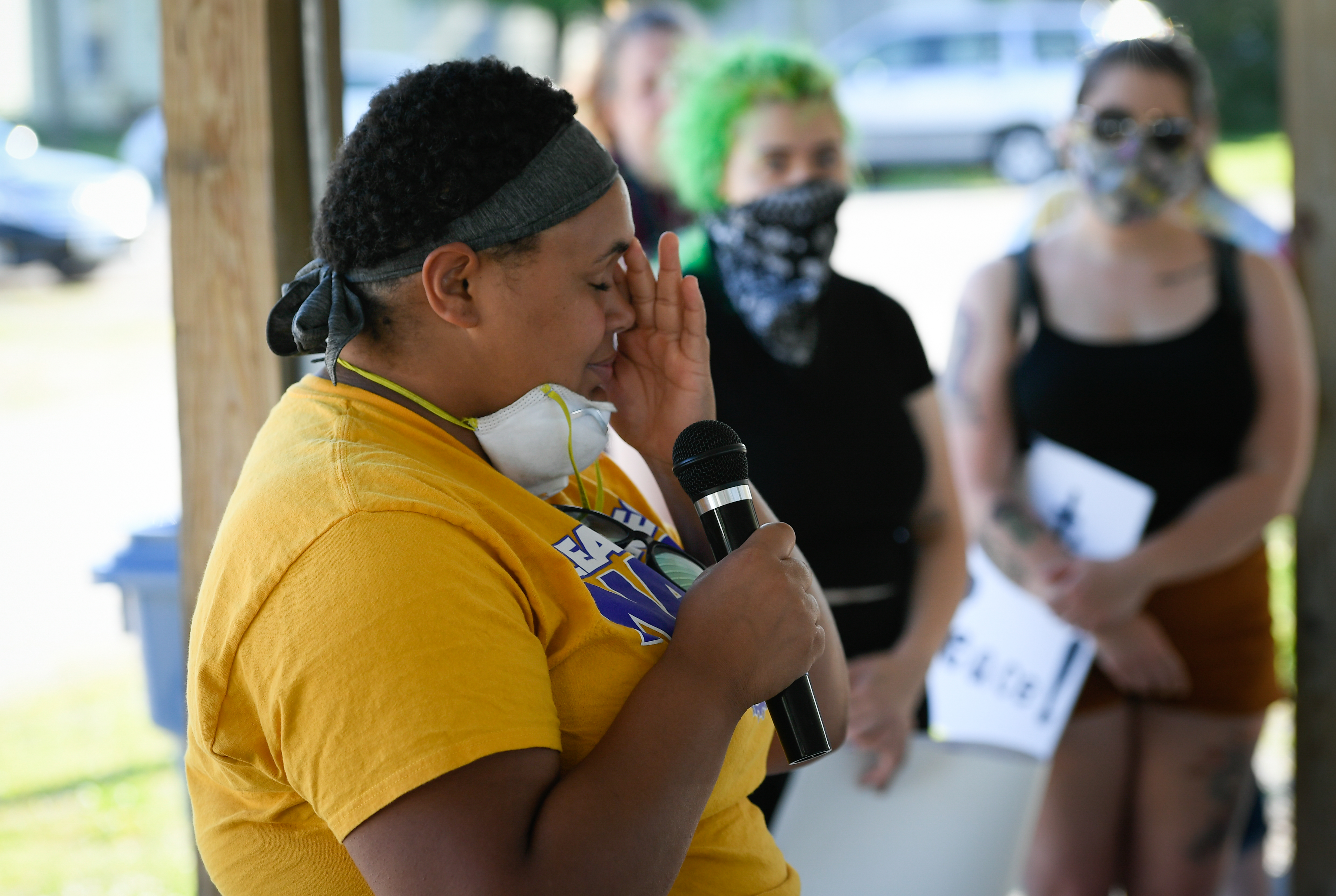 Iliawna Hook, a junior at Mercer County High School, composes herself after giving an emotional speech about her experiences with racism during school events.