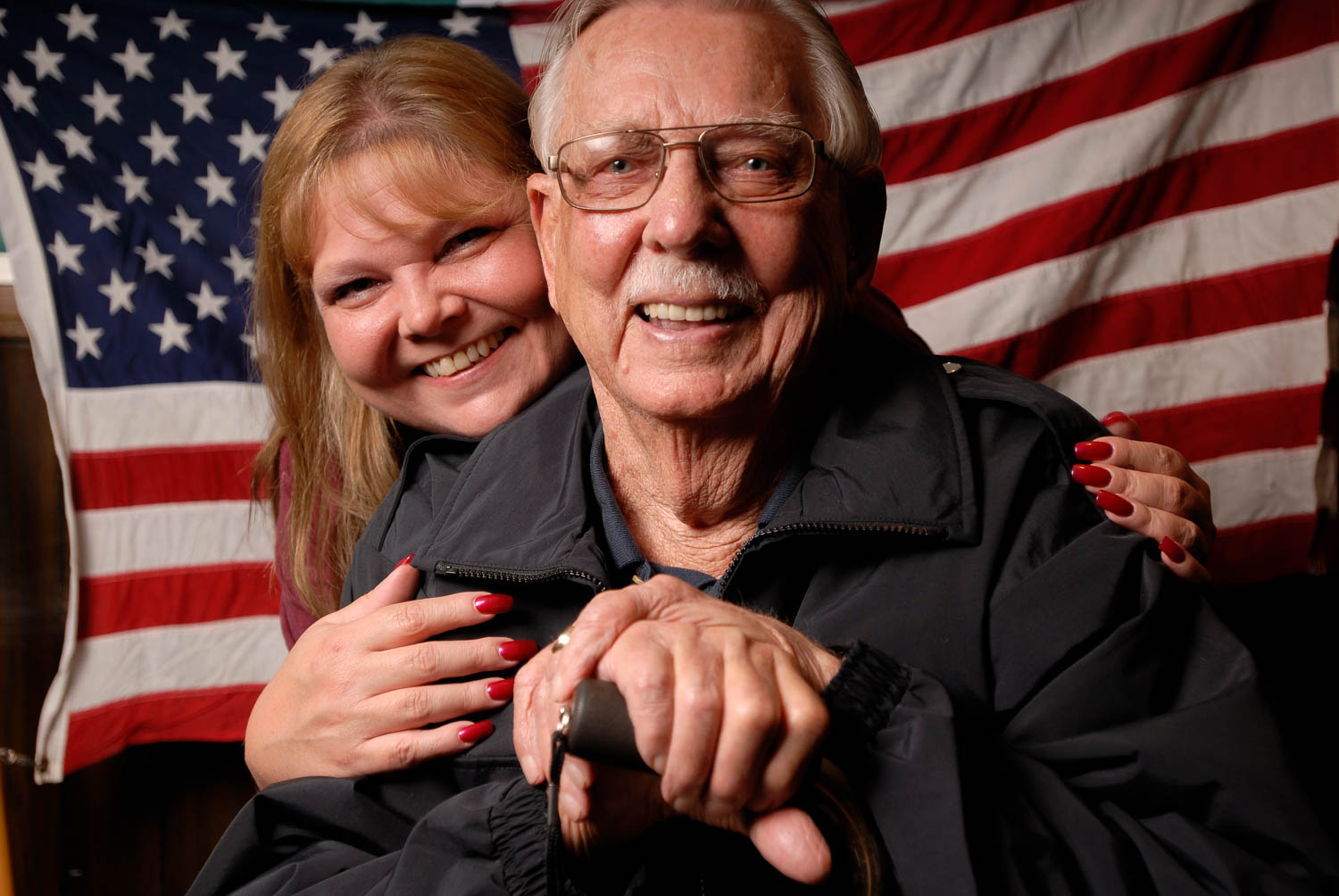 WWII veteran Joseph Colmer of East Moline will be accompanied by his daughter Sheri Jo Williams, left, and his son Bruce Colmer (not pictured) as they travel to Washington, D.C., Saturday as part of the inaugural Honor Flight of the Quad Cities. Mr. Colmer was a member of the U.S. Army's 82nd Airborne 325th Glider Infantry during WWII. On D-Day he and his unit landed 40-miles behind enemy lines and had to flight their way towards the beaches of Normandy to meet the advancing Allied forces. 