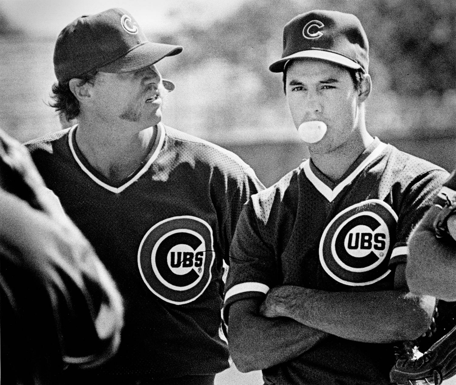 Future Hall of Famers - Veteran Cubs pitcher Goose Gossage reacts quizzically to third-year starter Greg Maddux blowing a bubble during a spring training workout in Mesa, Az. Both pitchers have since been inducted into the Baseball Hall of Fame. Gossage was inducted in 2008 and Maddux in 2014. (Todd Mizener)